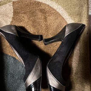 Unlisted heels.Black and pewter. 8.5